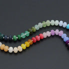 Natural Roundelle gemstone rainbow necklace by Bestbeads&Beyond featuring colorful round beads on a delicate chain.