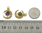 Gold CZ colorful star on crescent moon charm from Bestbeads&Beyond, featuring vibrant stones and detailed moon design.