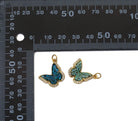 Dark blue Sparkle Micro Pave CZ Butterfly Charm pendant from Bestbeads&Beyond, showcasing intricate micro pave detailing.