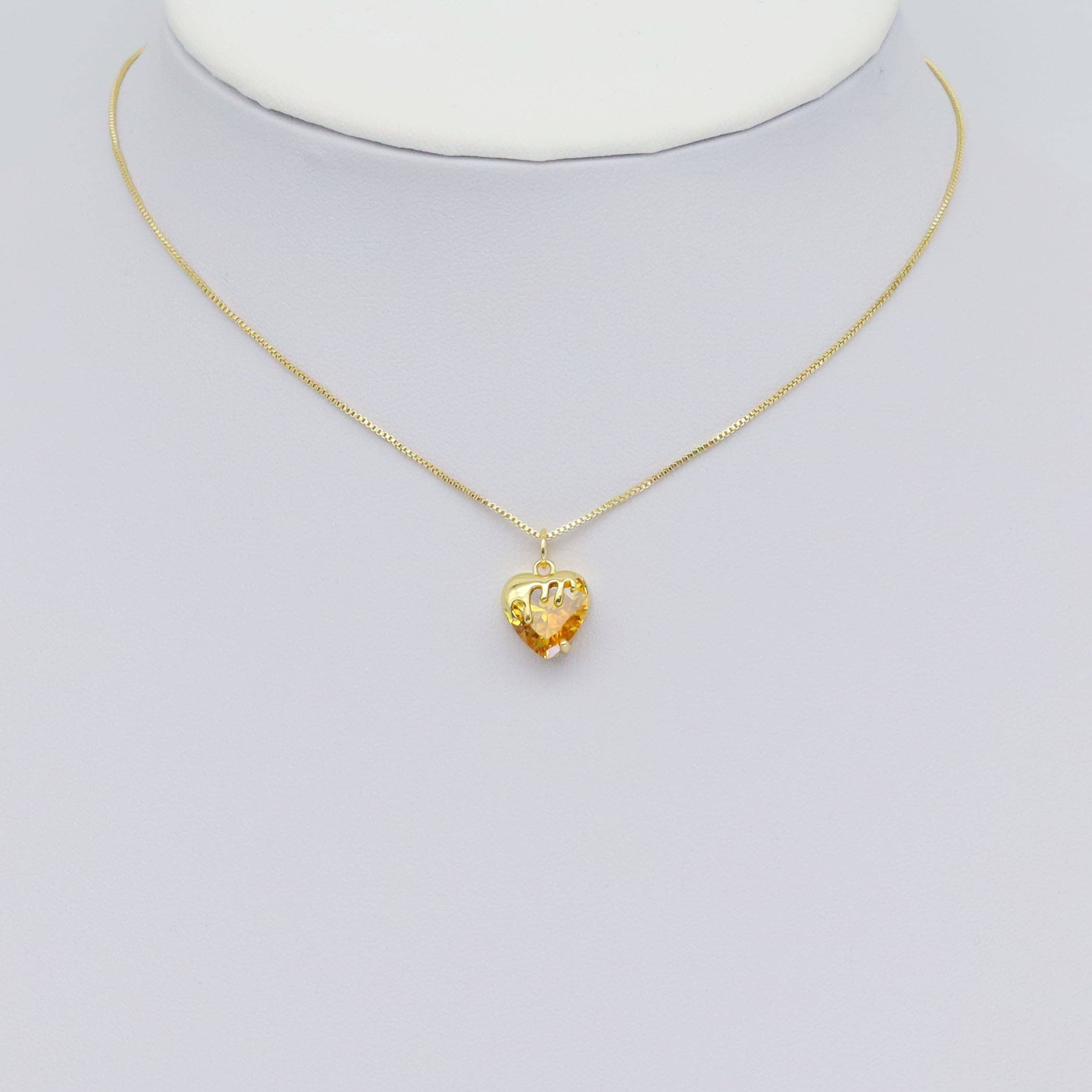 Gold-colored CZ dipped heart charm pendant with colorful CZ accents, designed for jewelry making by Bestbeads & Beyond.