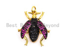 Black beetle-inspired charm with fuchsia cubic zirconia micro pave, gold, rose gold, silver, or black finish, 23x25mm.