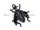 Beetle-inspired charm pendant with fuchsia cubic zirconia, available in gold, rose gold, silver, and black, 23x25mm.