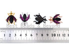 Black beetle-inspired charm pendant with fuchsia cubic zirconia accents, gold, rose gold, silver, and black finishes, 23x25mm.