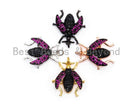 Black beetle-inspired charm pendant with fuchsia cubic zirconia micro pave, available in gold, rose gold, silver, and black finishes.