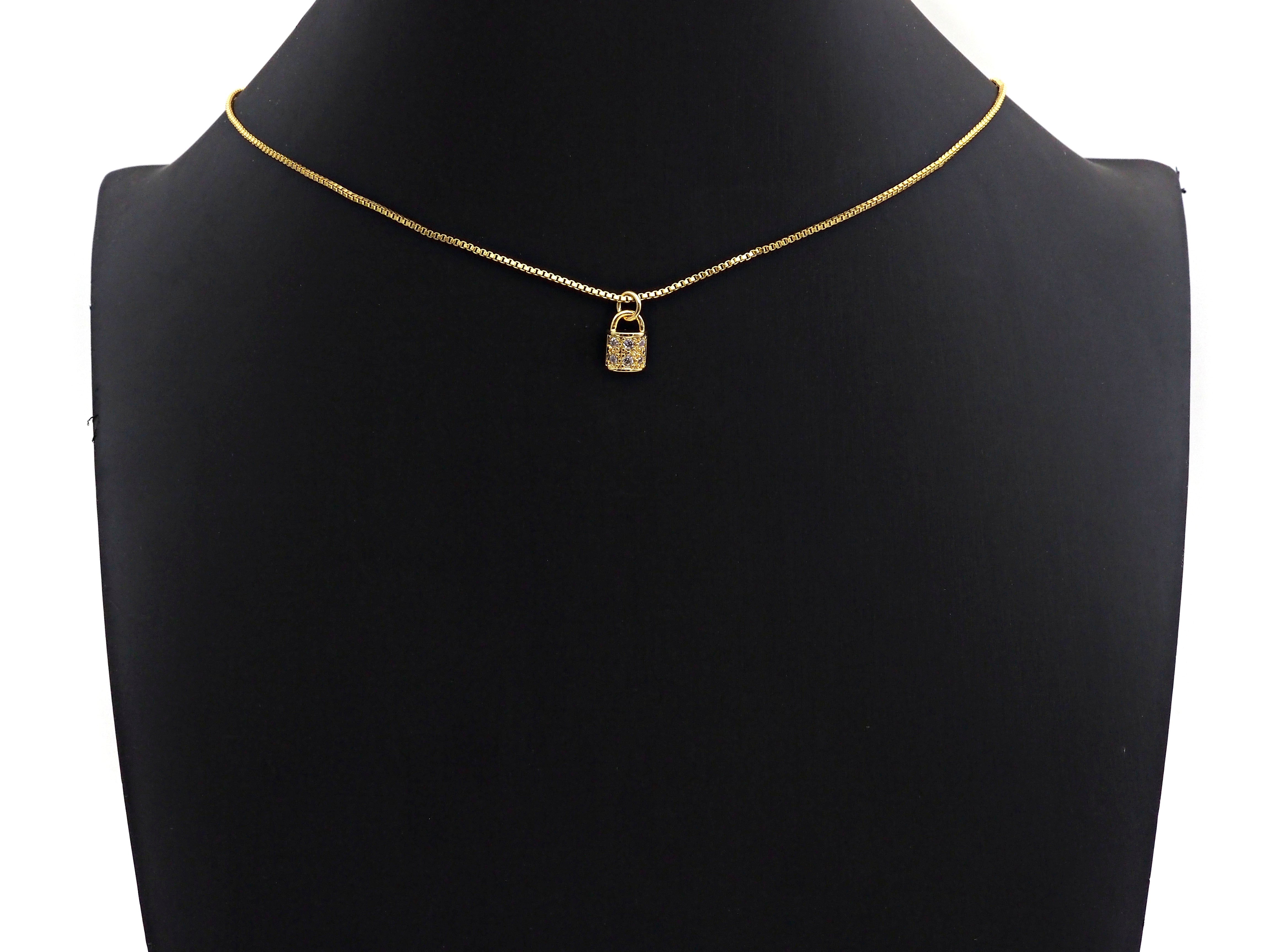 CZ Micro Pave Lock Pendant in clear cubic zirconia with silver, gold, rose gold, or black plating, 7x10mm charm for jewelry.