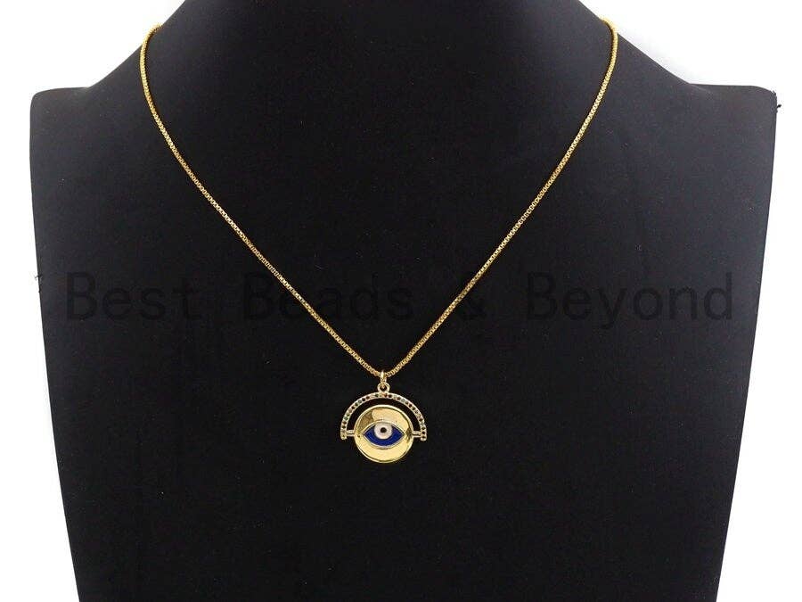 Gold-plated colorful CZ pave round pendant with cobalt evil eye charm, 22x22mm coin-shaped jewelry accessory.