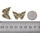 Gold colorful CZ butterfly charm pendant from Bestbeads & Beyond, showcasing vibrant cubic zirconia details and intricate butterfly design.