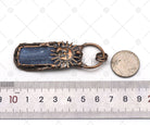 Blue Kyanite and sunflower pendant charm from Bestbeads&Beyond, featuring a detailed blue Kyanite gemstone and sunflower design.