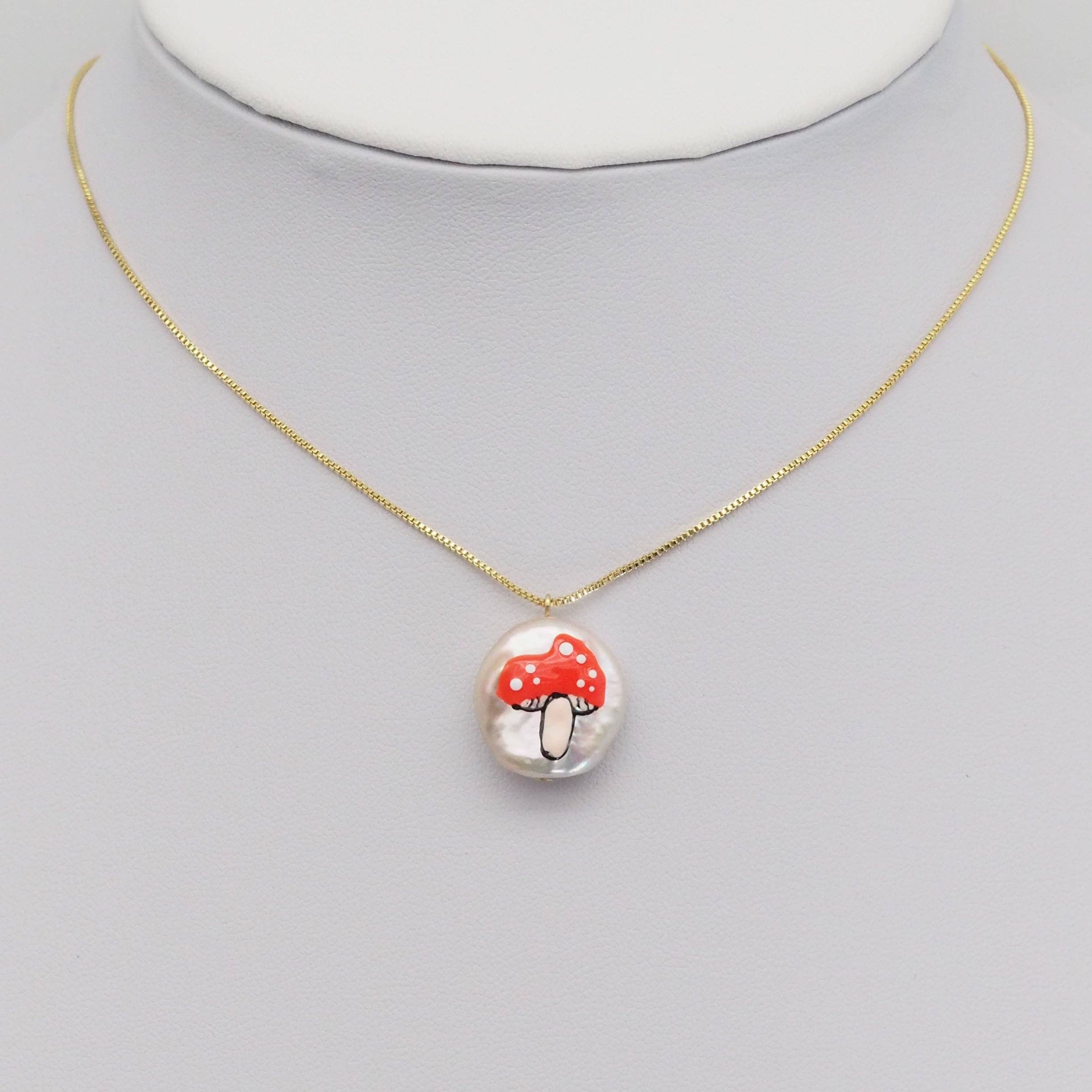 Red mushroom pendant with white pearl, individual charm from Bestbeads&Beyond, perfect for jewelry making or accessories.