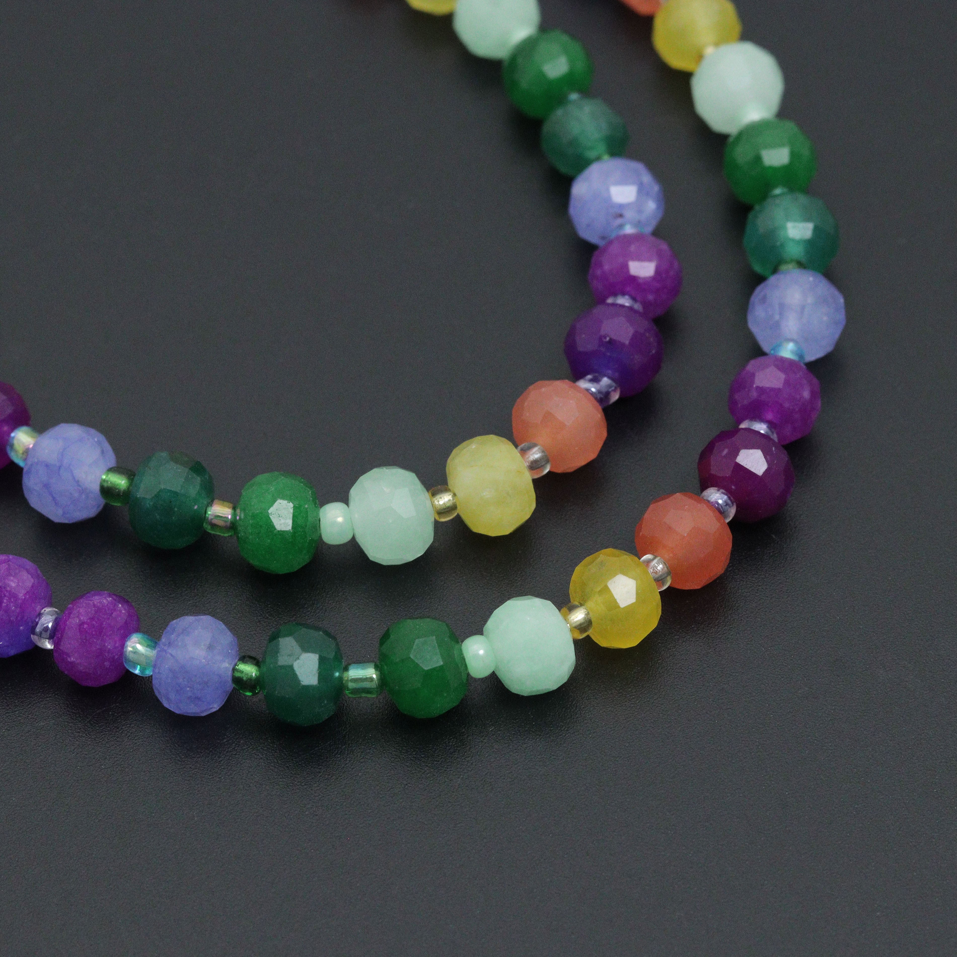 Colorful jade beads jewelry set featuring an adjustable necklace and bracelet by Bestbeads&Beyond with vibrant gemstone accents.