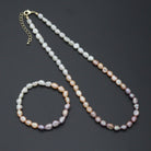 Multicolor freshwater pearl jewelry set featuring a necklace and bracelet by Bestbeads&Beyond with elegant pearl accents.