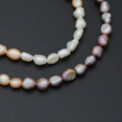 Multicolor freshwater pearl jewelry set featuring a necklace and bracelet from Bestbeads & Beyond, SKU EF805.