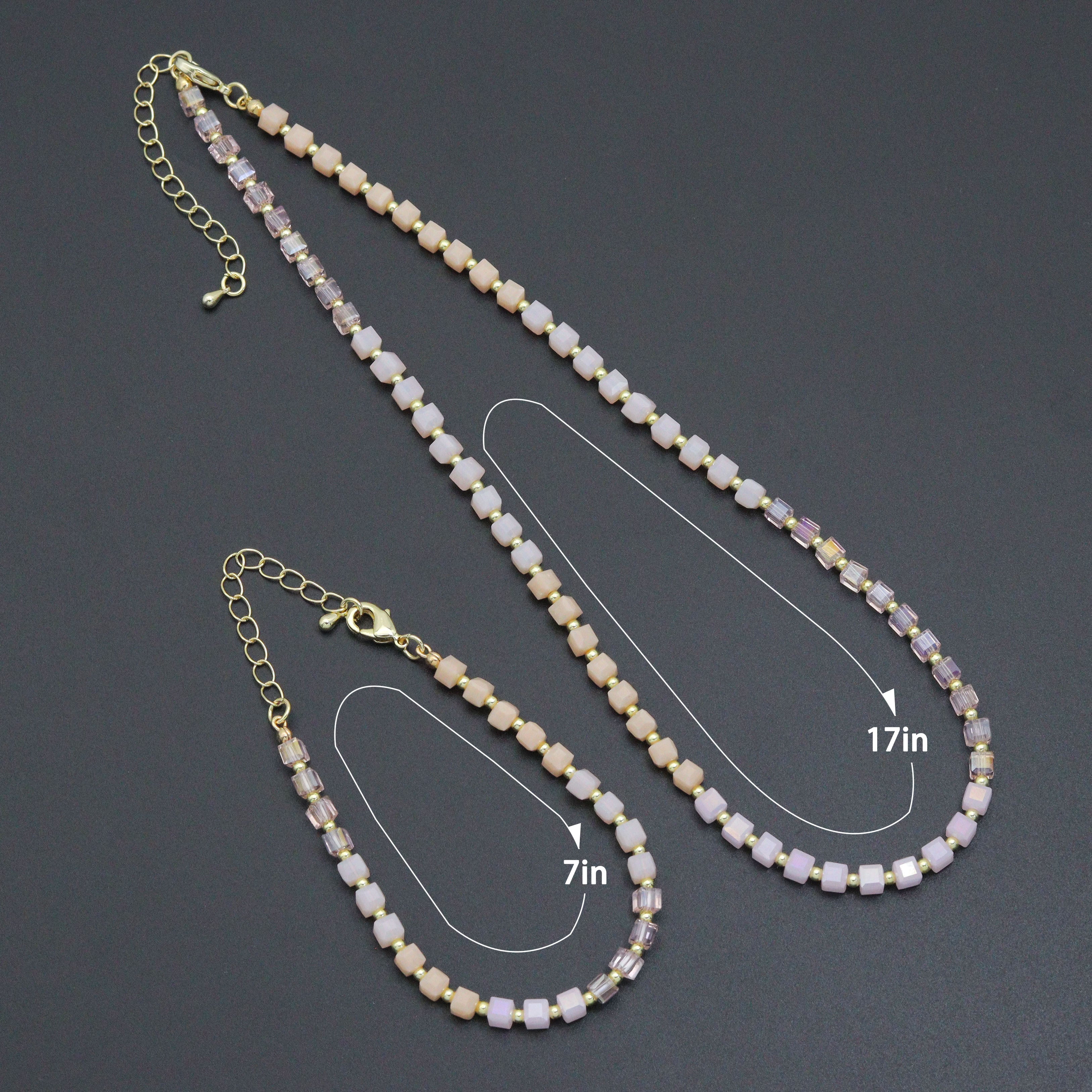 Bestbeads&Beyond ombré pink champagne cube beads jewelry set with matching necklace and bracelet on a display.