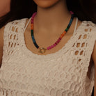 Pink Rainbow Adventure Green Roundelle Gemstone necklace by Bestbeads&Beyond featuring vibrant pink and green gemstones.