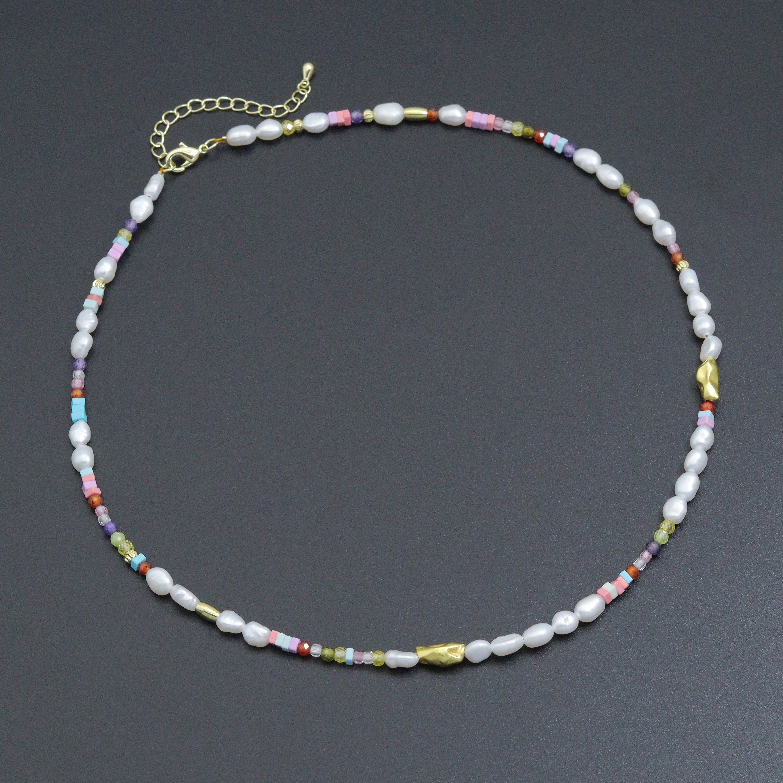Freshwater pearl gold spacer beads adjustable necklace by Bestbeads&Beyond with delicate pearl and gold accents.
