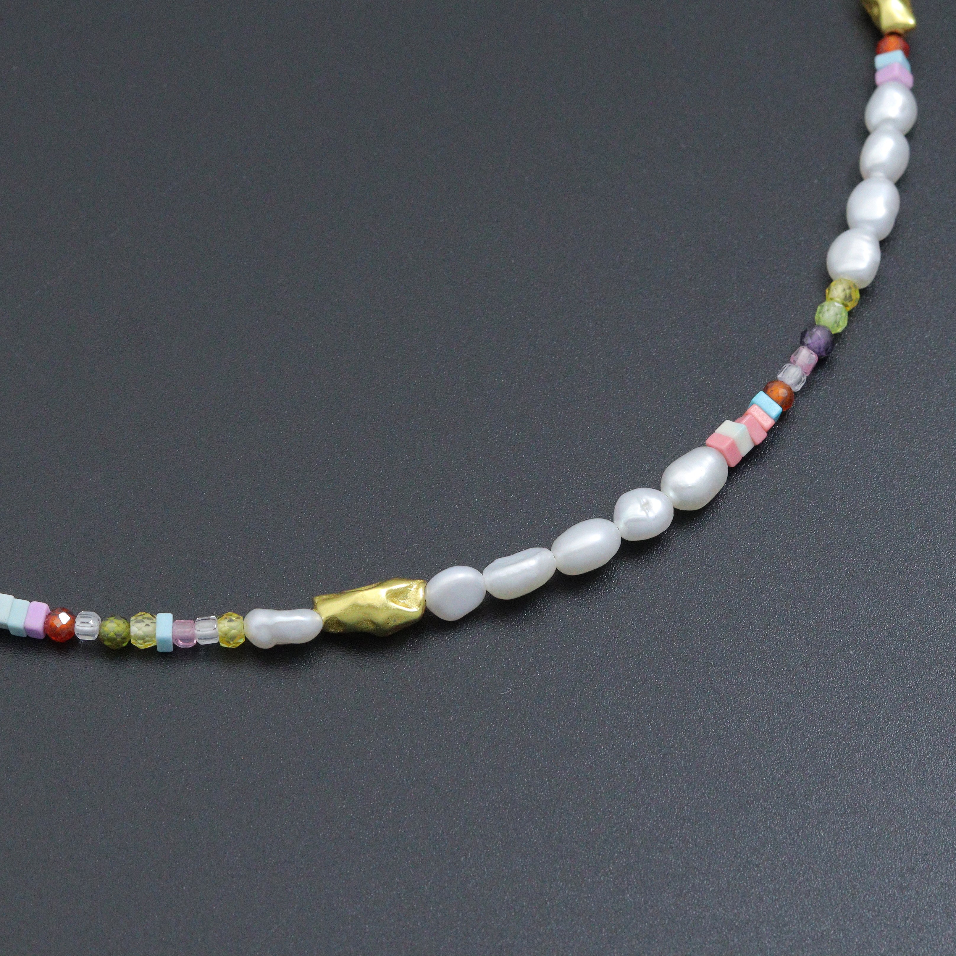 Freshwater pearl and gold spacer bead adjustable necklace by Bestbeads&Beyond, featuring a delicate chain with pearls and gold accents.