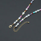 Freshwater pearl and gold spacer beads adjustable necklace by Bestbeads & Beyond, shown with delicate pearl and gold bead details.