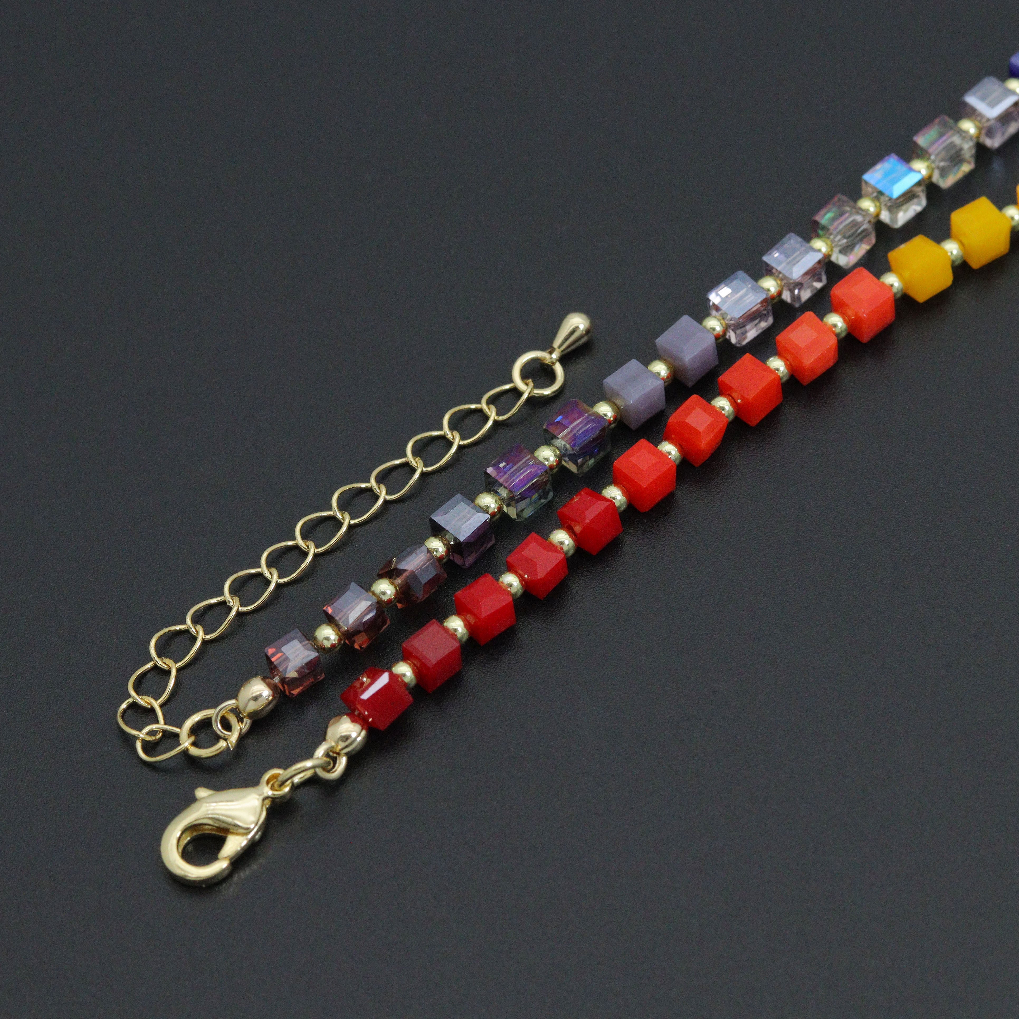 Rainbow Cube Crystal Beads Necklace by Bestbeads & Beyond featuring colorful cube-shaped crystal beads on a stylish necklace.