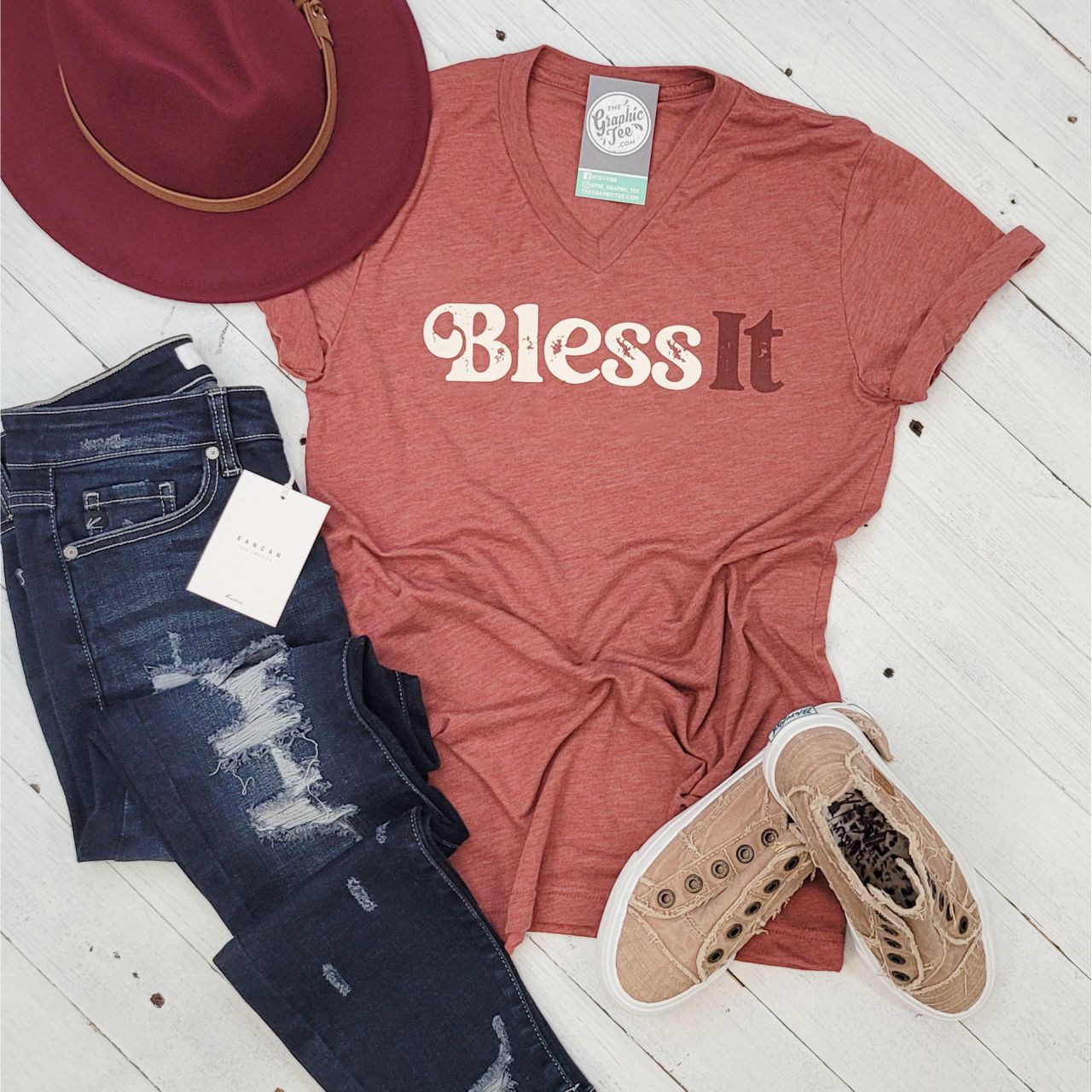 Blue Bless It V Neck Tee from The Graphic Tee, short sleeve graphic t-shirt with a relaxed fit and vibrant design.