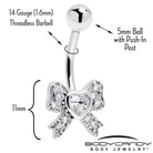 Clear cubic zirconia heart bow belly ring by BodyCandy featuring a shiny heart-shaped charm and sleek gold body jewelry.