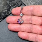 Purple dangle belly ring with clear gem butterfly and rose flower design by BodyCandy, featuring a stylish and decorative jewelry piece.