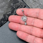 Clear gem Celtic knot dangle belly ring by BodyCandy, featuring an elegant design and dangling style for pierced belly jewelry.
