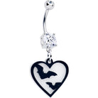 Glow-in-the-dark flying bat and heart dangle belly ring by BodyCandy, featuring a dark-themed design with bat and heart charms.