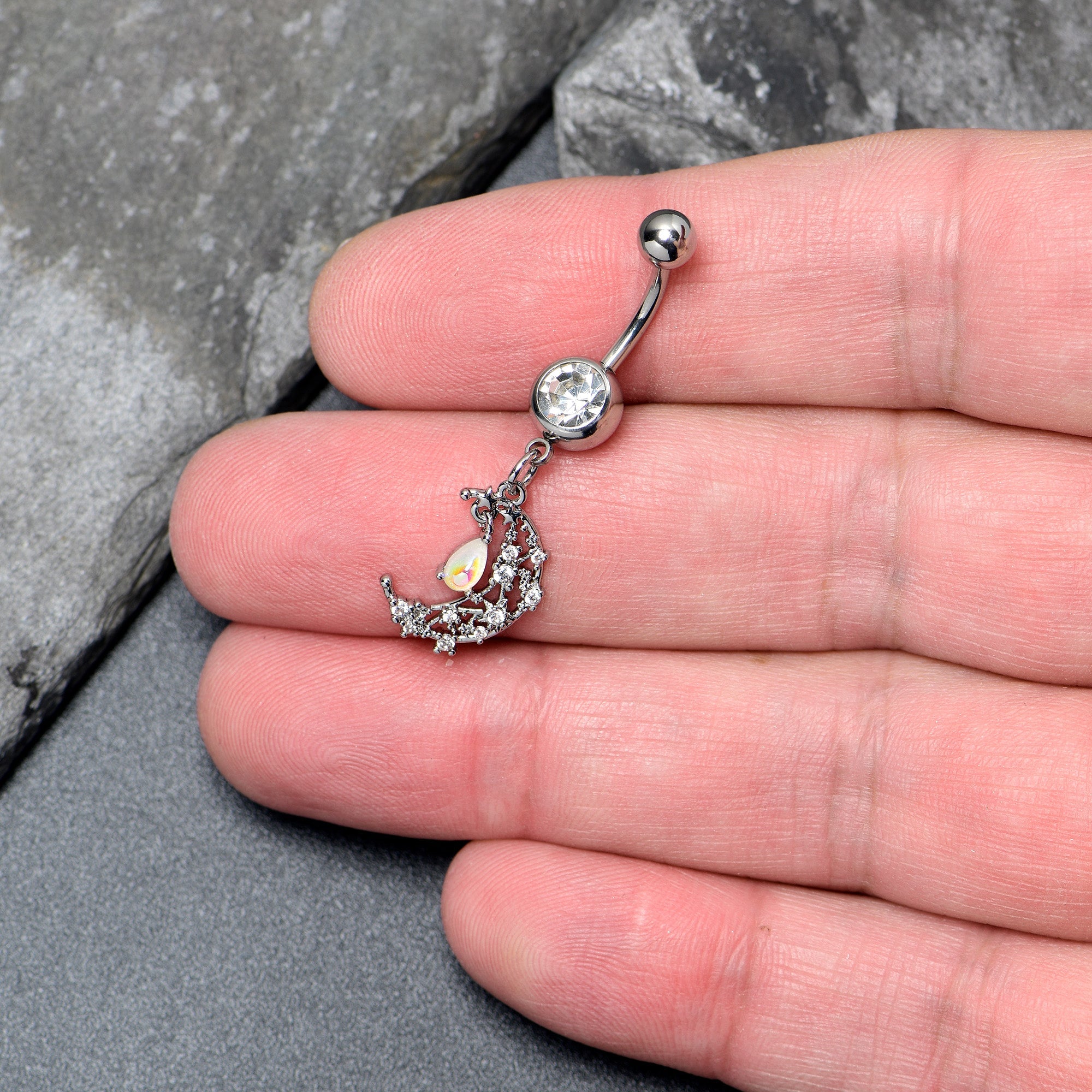 White clear gem constellation moon dangle belly ring by BodyCandy with a silver-tone design and sparkling gemstone accents.