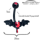Red gem black bleeding heart bat belly ring by BodyCandy, featuring a detailed bat design with a dangling red gem.
