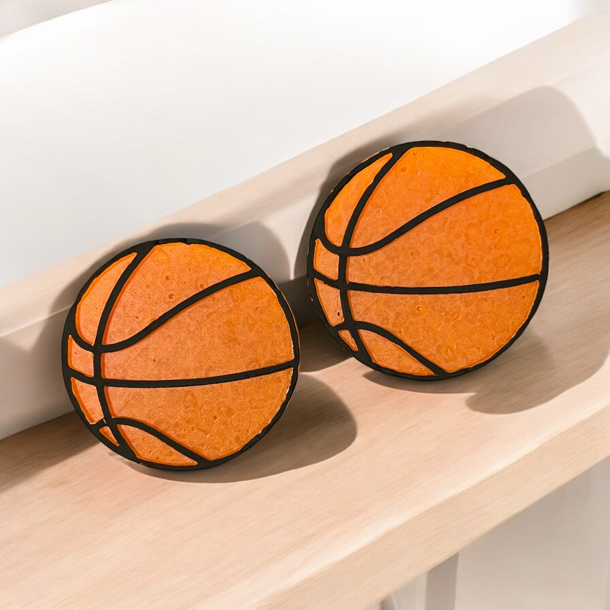 Basketball vent clips and magnets by Bug & Bean Freshies, featuring colorful basketball designs for car air vents.