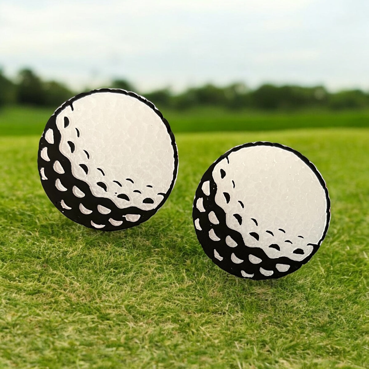 Golf ball vent clips and magnets by Bug & Bean Freshies, featuring colorful golf ball designs for car air vents.