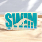 Bug & Bean Freshies Swim Freshie, a colorful scented accessory with a playful design for swimwear freshness.