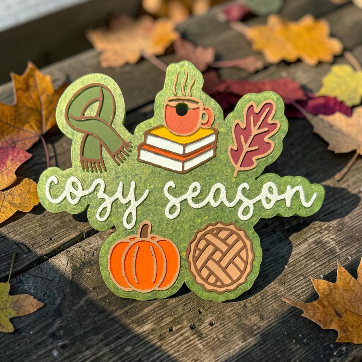 Bug & Bean Freshies Cozy Season Freshie air freshener with a cozy seasonal scent in a small, decorative package.