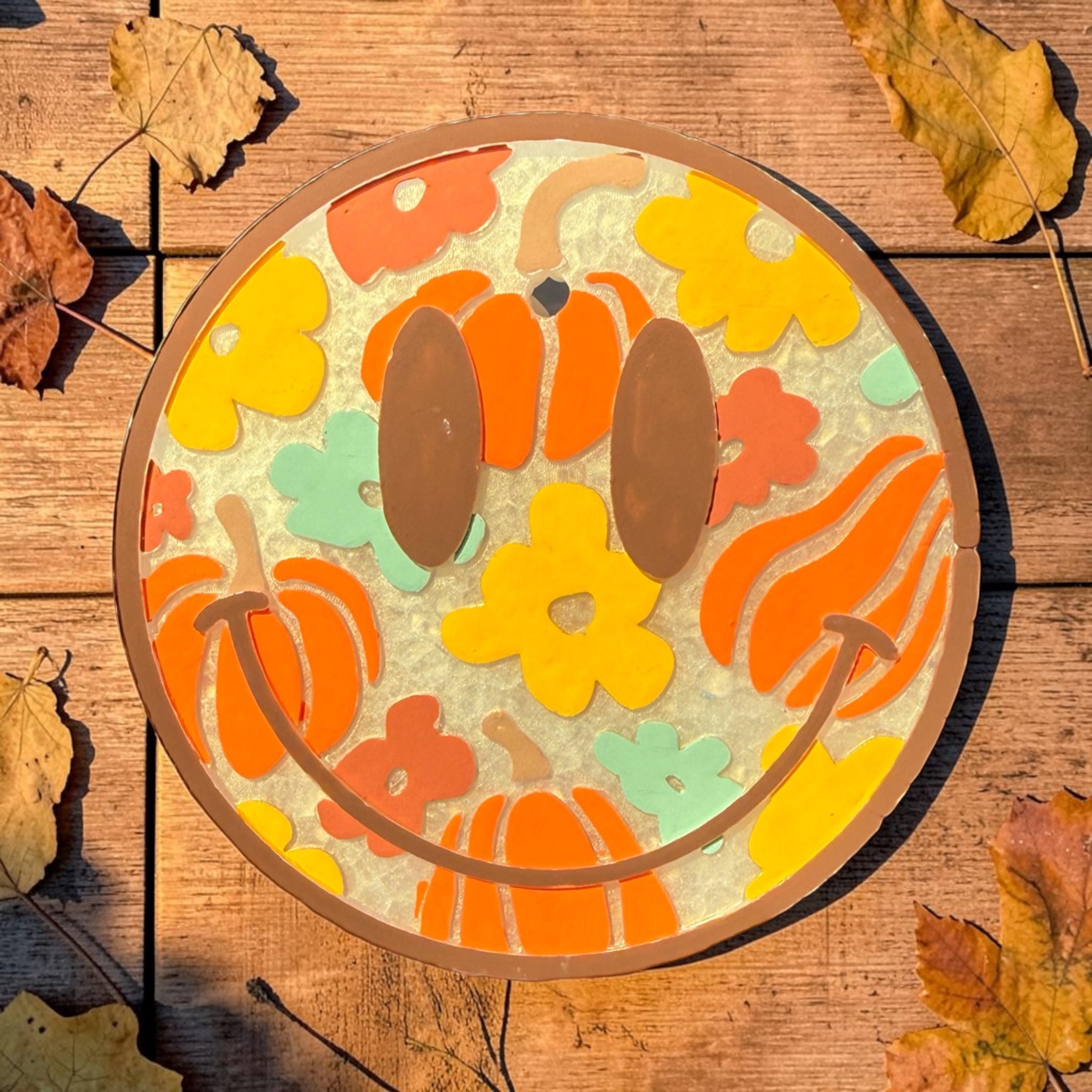 Fall Smiles Freshie by Bug & Bean Freshies showing a colorful, scented decorative air freshener with autumn-themed design.