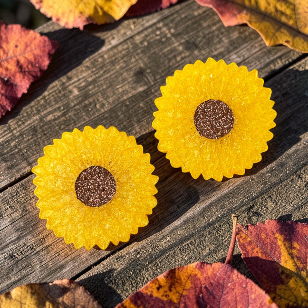 Sunflower-themed vents and magnetic accessories by Bug & Bean Freshies, featuring bright sunflower designs and functional magnetic clips.