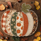 Patchwork Pumpkin Freshie by Bug & Bean Freshies, decorative pumpkin-shaped air freshener with colorful patchwork design.