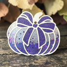 Purple Sparkle Pumpkin Freshie by Bug & Bean Freshies, with a glittery pumpkin shape and vibrant purple color.