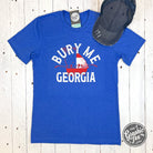 The Graphic Tee Bury Me In Georgia short sleeve graphic T-shirt featuring a country-themed design on white fabric.