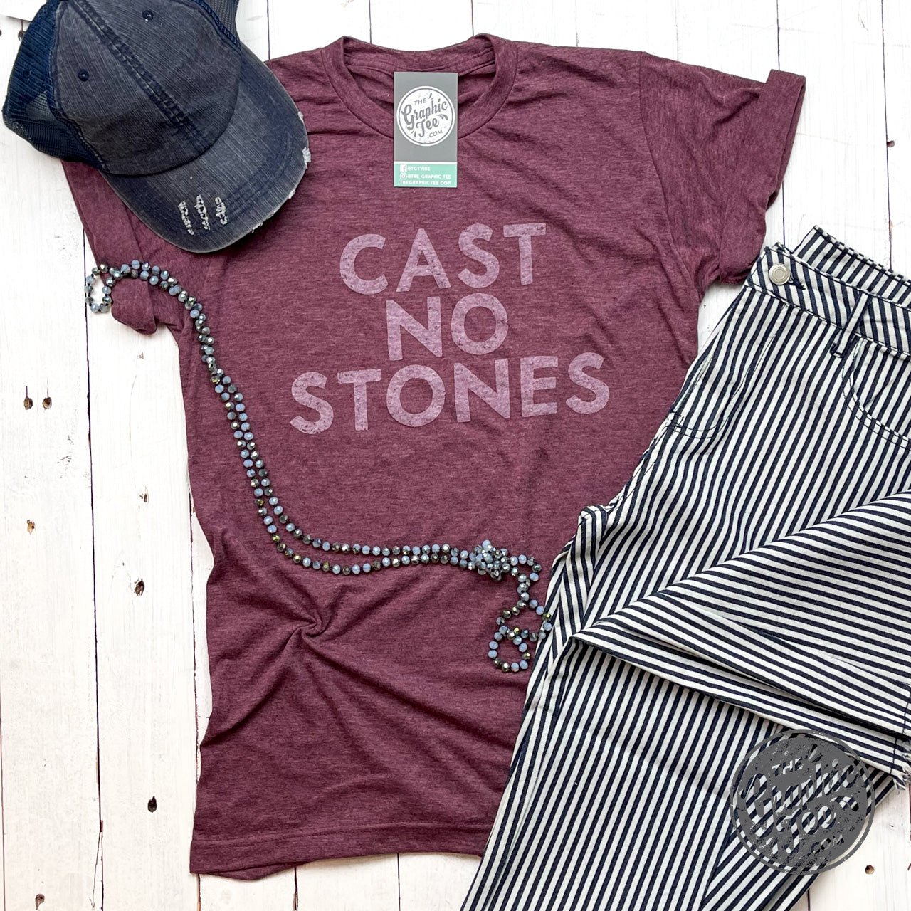 Heather burgundy short sleeve graphic tee by The Graphic Tee, featuring the Cast No Stones design on a casual, comfortable shirt.