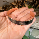 Mystical Celtic Spiral Copper Cuff Bracelet by Celtic Crystal Design Jewelry with intricate Celtic spiral patterns.