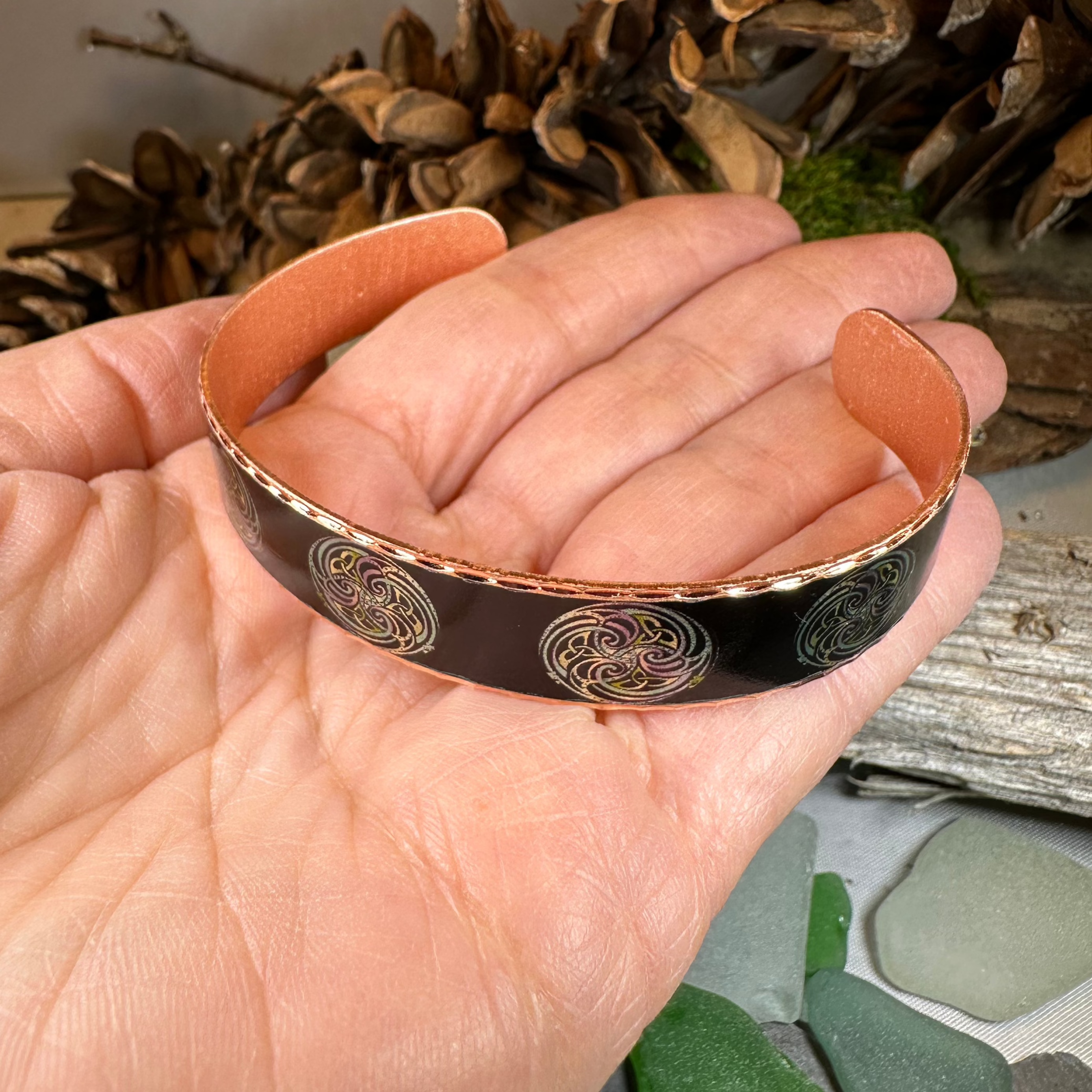 Mystical Celtic Spiral Copper Cuff Bracelet by Celtic Crystal Design Jewelry with intricate Celtic spiral patterns.
