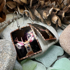 Highland Stag Copper Dangle Earrings by Celtic Crystal Design Jewelry, featuring intricate stag design and handcrafted copper craftsmanship.