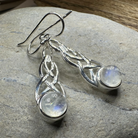 Celtic Crystal Design Jewelry Marion Celtic Moonstone Dangle Earrings with intricate Celtic patterns and luminous moonstone stones