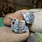 Celtic Crystal Design Jewelry dangle earrings featuring old-fashioned teapot and cup charms in silver-tone metal.