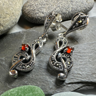 Celtic Crystal Design Jewelry Rhapsody music note dangle earrings with intricate detailing and silver-tone finish.