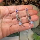 Celtic Crystal Design Jewelry fairy waterfall mystic topaz dangle earrings with shimmering blue topaz stones and intricate Celtic detailing.