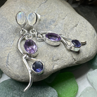 Celtic Crystal Design Jewelry dangle earrings with Mystic Topaz stones resembling a fairy waterfall, intricate silver details.