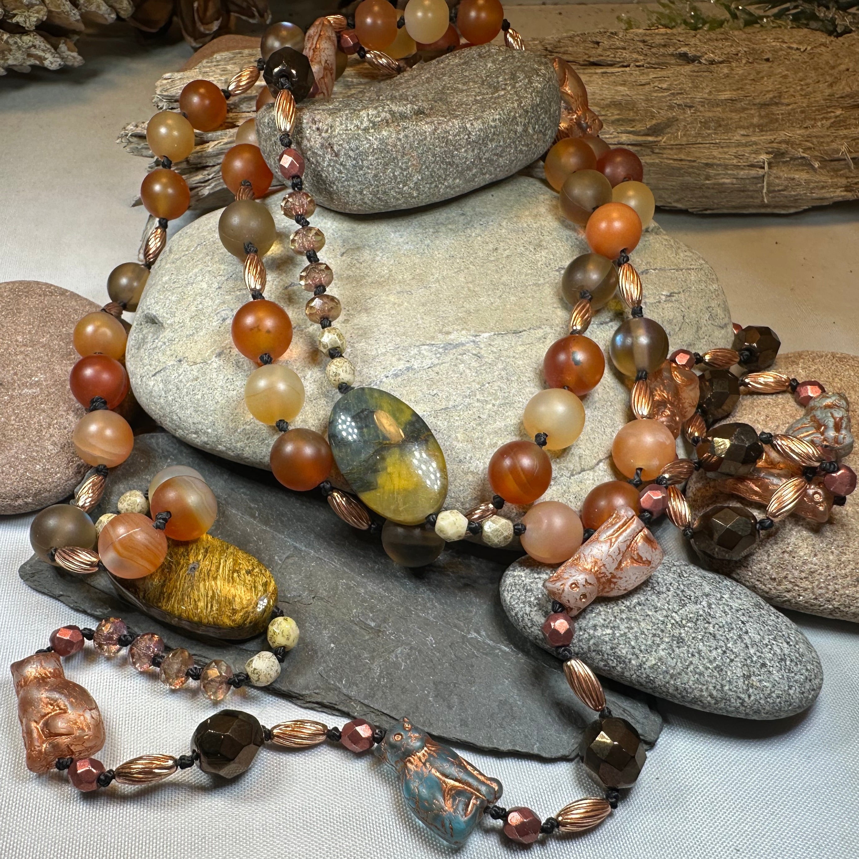 Copper Autumn Cat long necklace by Celtic Crystal Design Jewelry, featuring a detailed autumn-themed cat pendant.
