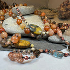 Copper Autumn Cat Long Necklace from Celtic Crystal Design Jewelry, featuring a detailed feline pendant on a long chain.