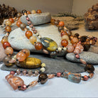 Copper Autumn Cat long necklace by Celtic Crystal Design Jewelry featuring a detailed cat pendant on a sleek necklet.